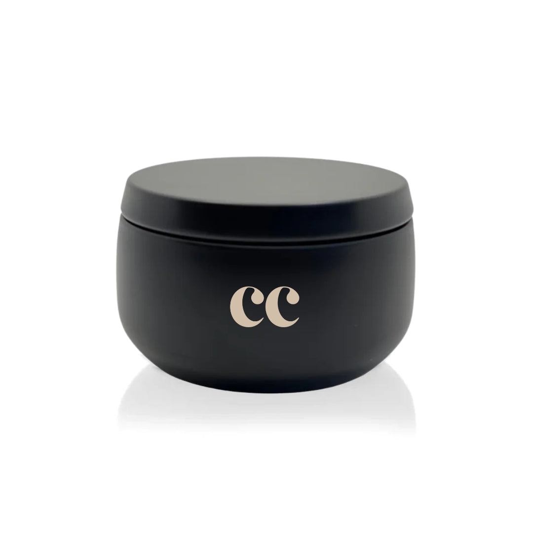 Front view of 8oz matte black tin candle with custom logo imprint.