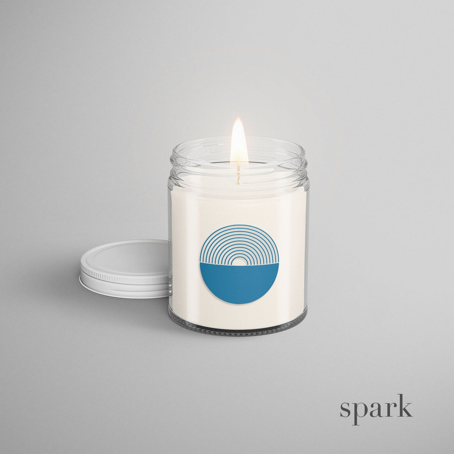 Front view of custom 8oz clear glass candle with single-color logo imprint.