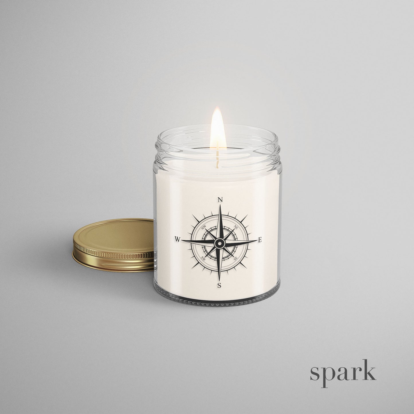 8oz clear glass candle with custom logo and gold metal lid.