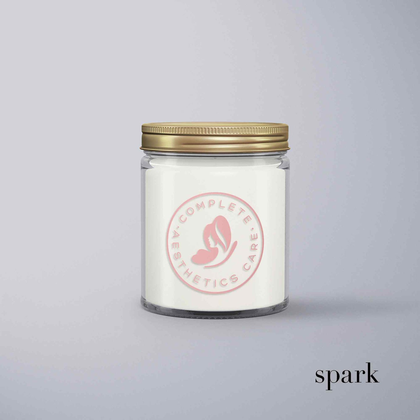 Branded 8oz clear glass jar candle with custom logo imprint and gold screw top lid
