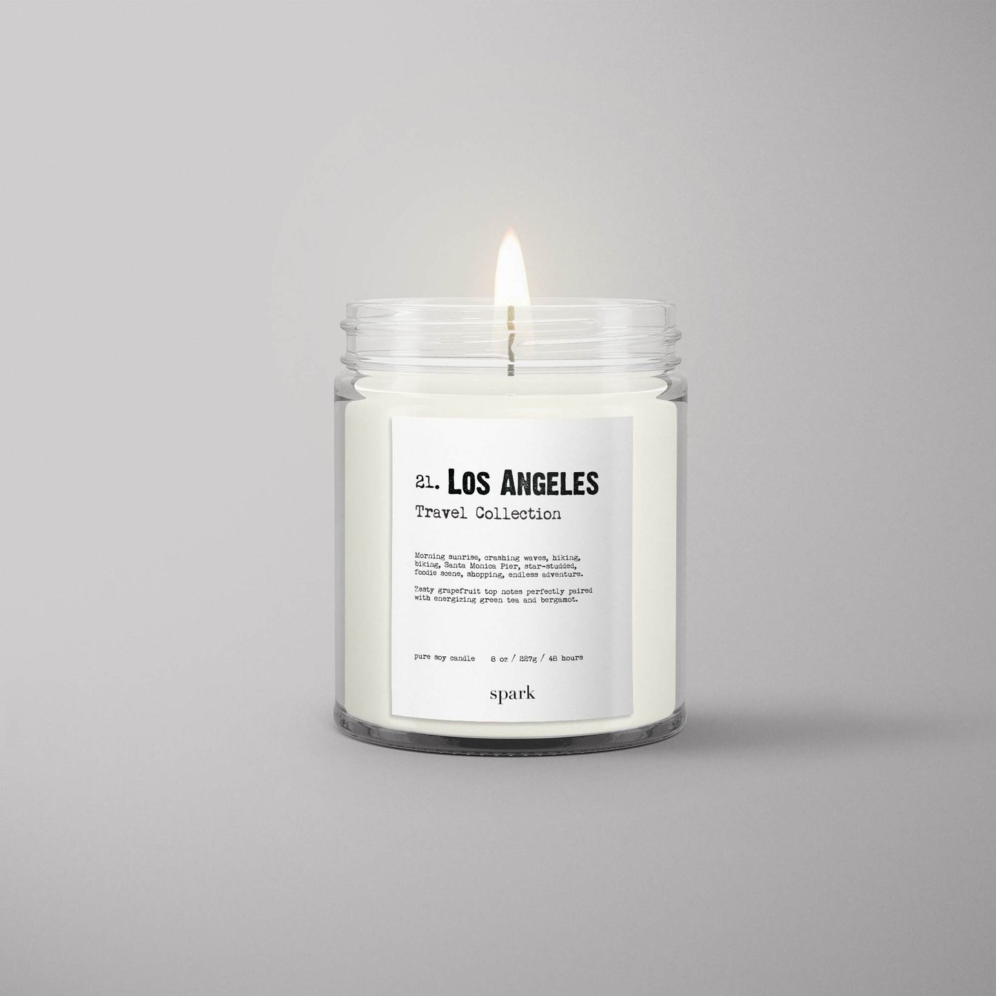 Custom branded 8oz clear glass jar candle with full-color label.