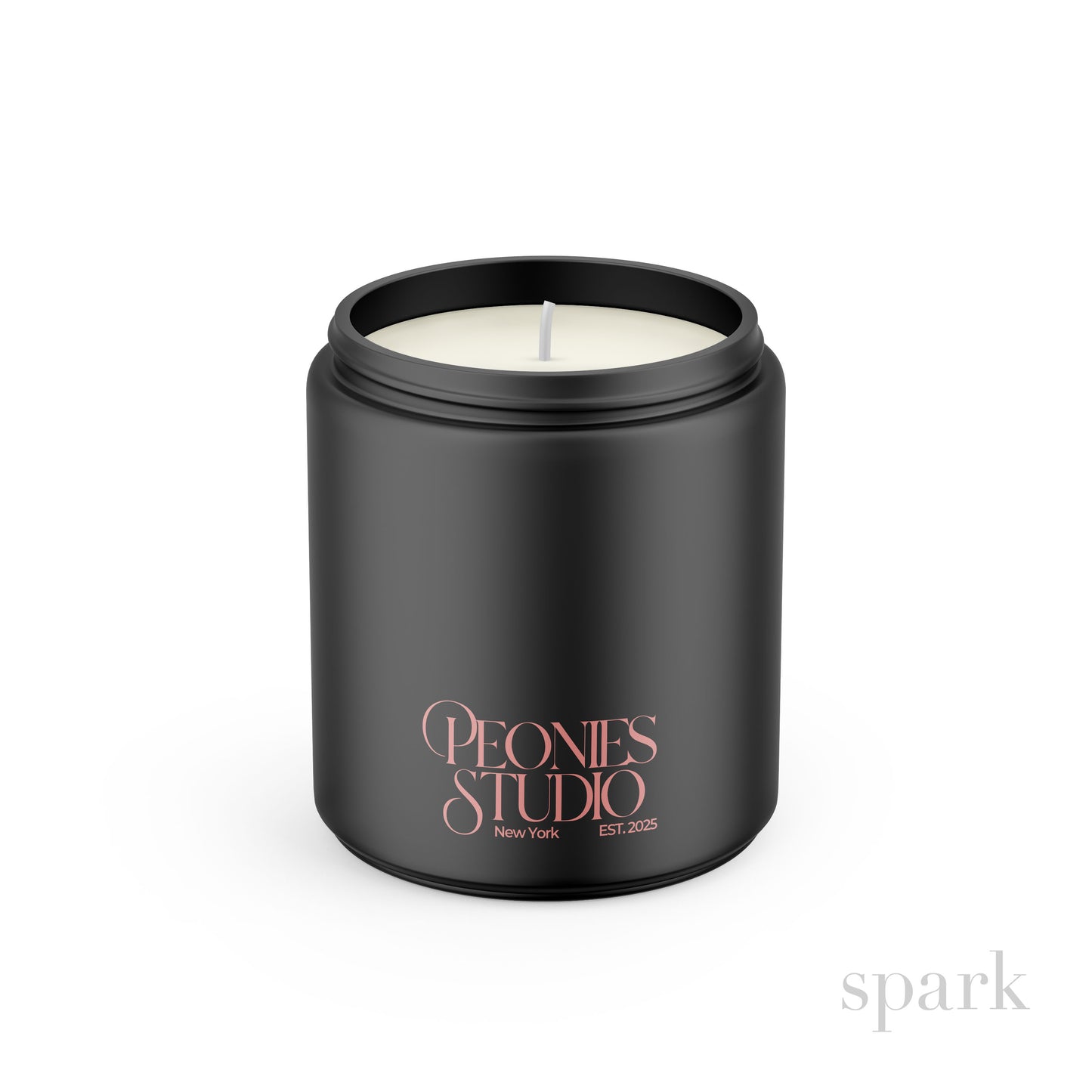 Close-up of single-color logo imprint on an 8oz matte black glass candle.”