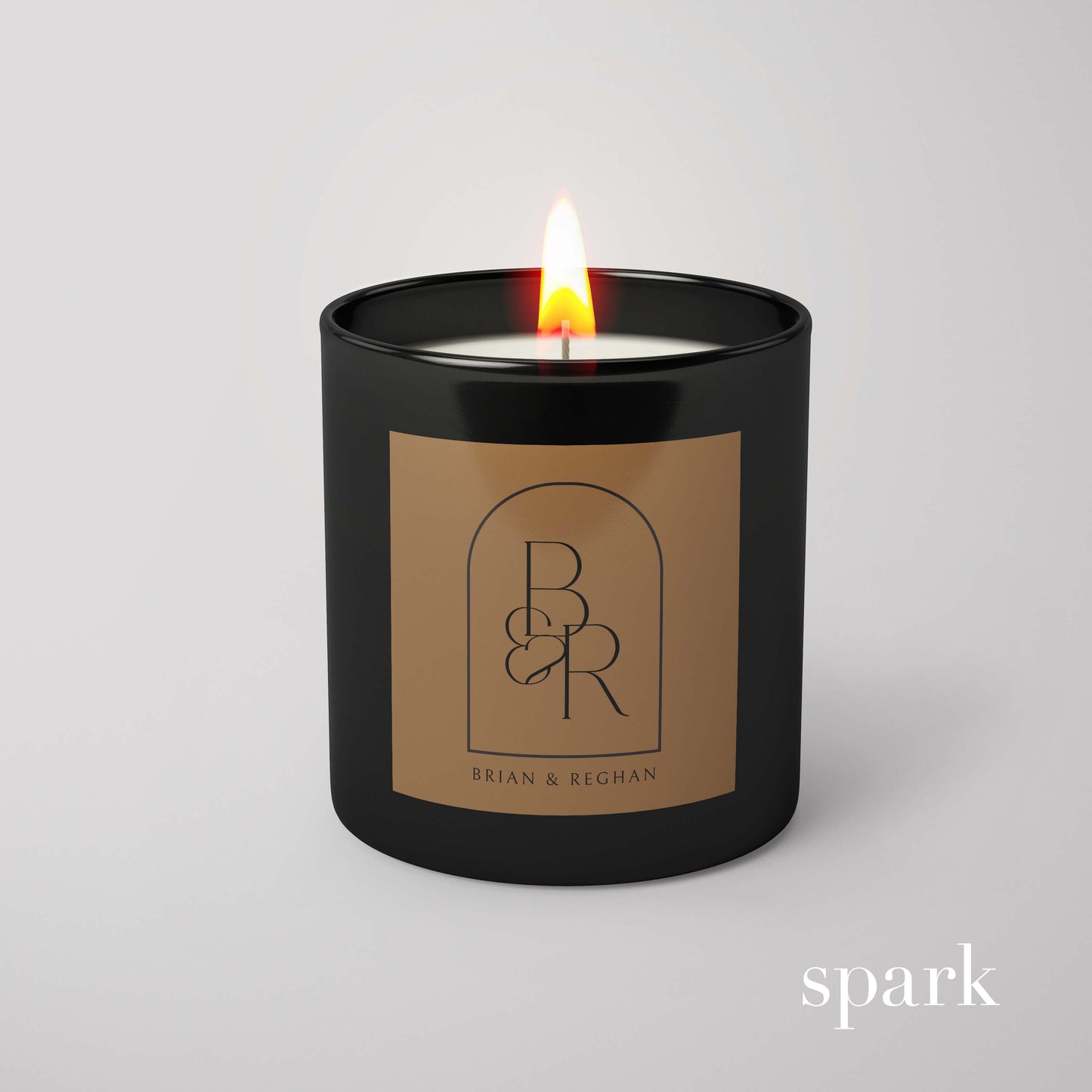 Custom branded matte black glass candle produced by a candle manufacturer for retail collections and corporate gifts.
