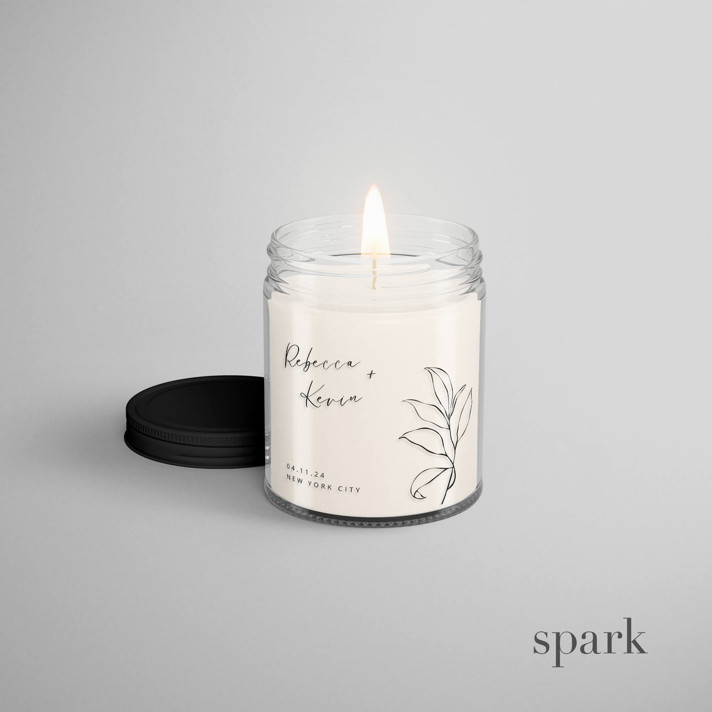 Custom wedding candles in 4oz clear glass candle with logo imprint and black lid