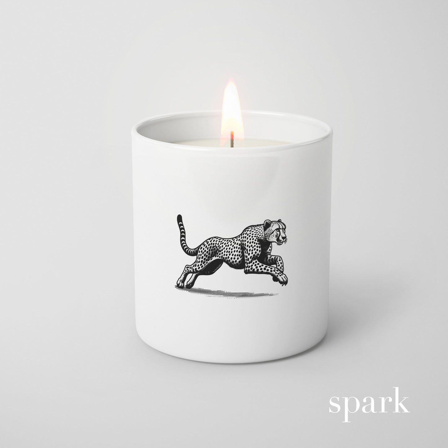 Close-up of single-color logo imprint on a 10oz matte white glass candle.