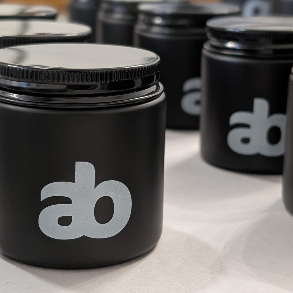 Custom Branded Merch Swag Private Label Candle Collection 4oz Black Glass Jar White Logo